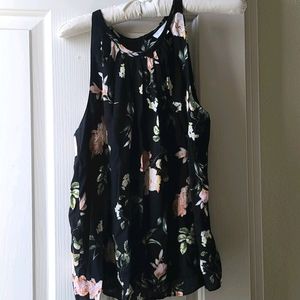 Black cut out sleeveless blouse